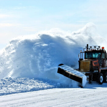 Snow Plow Throwing Snow