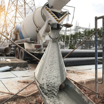 Cement truck pouring cement